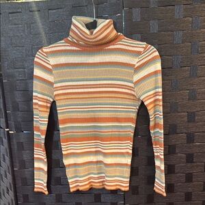 Vibrant Orange and Blue Turtleneck Sweater with Stripes